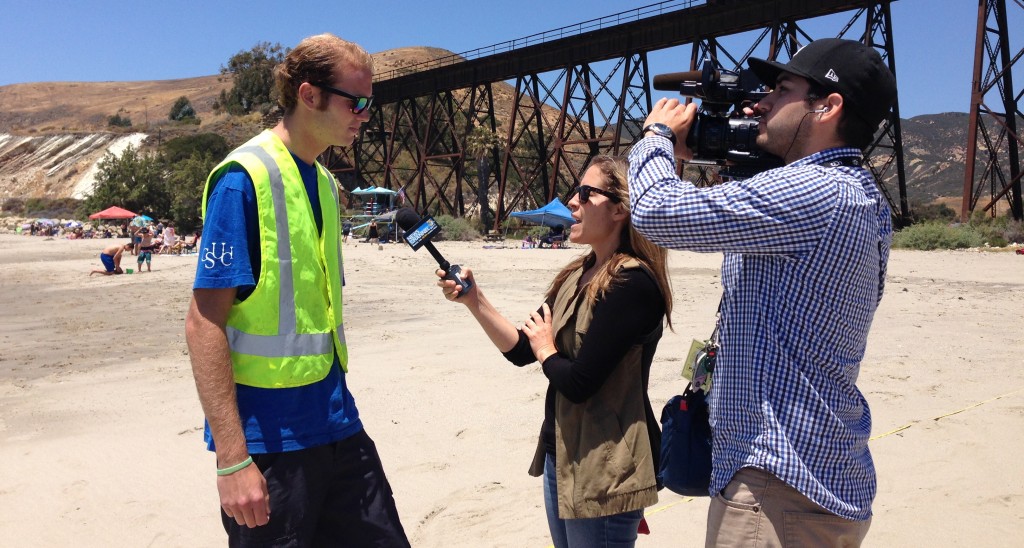 Senior ESRM member Tevin Schmitt being interviewed by KEYT3's Alys Martinez at Gaviota State Beach on March 24, 2015.